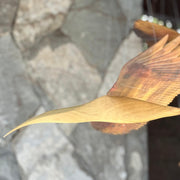 Pájaro tallado zarpito